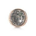 Pink signet ring with diamonds inlaid with an old coin Royalty Free Stock Photo