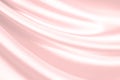 Pink silk satin background. Soft wavy folds on the fabric. Wedding, anniversary, Valentine`s day, celebration. Beautiful pink abst Royalty Free Stock Photo