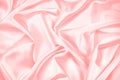 Pink silk satin background. Soft wavy folds on the fabric. Wedding, anniversary, Valentine`s day, celebration. Beautiful pink abst Royalty Free Stock Photo