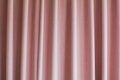 Pink silky satin curtains drapery background for presentation.