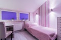 Pink single bedroom in apartment