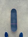 Pink Skateboard on Smooth Concrete Surface