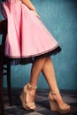 Pink skirt and wedge high heel shoes Royalty Free Stock Photo