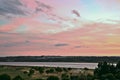 Pink sky at dusk over the Guadiana river, Ayamonte, Spain