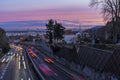 Pink Sky Over Paris at Sunrise With Highway Traffic Royalty Free Stock Photo