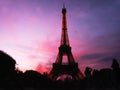 Pink Sky in Paris over The Eiffel Tower at Night Royalty Free Stock Photo