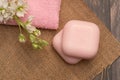 Pink small soap bars and facial towel Royalty Free Stock Photo