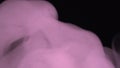 Pink smoke on a black background. Slow motion. Intro, outro. The mystical fog. The footage, the texture of the smoke. Equalizer, v