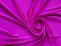 Pink smooth elegant luxurious satin background texture close up - abstracted wallpaper