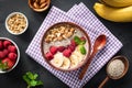 Pink smoothie bowl with raspberry banana