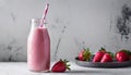 Pink smoothie in glass bottle with paper straw, fresh strawberries. Tasty and healthy drink