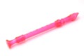 the pink soprano recorder in a white background