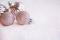 Pink Sparkly Christmas Ornaments Over Glitter