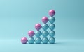 Pink spheres on rising bar graph of blue spheres on blue background, abstract modern minimal success, growth, progress or Royalty Free Stock Photo