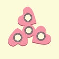 Pink spinner with hearts.