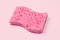 Pink sponge on pastel pink background Royalty Free Stock Photo