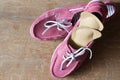 Pink sport shoes with orthopedic insoles. Pair of sneakers on