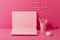 Pink stationery and pink laptop on pink background, barbie concept style