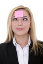 Pink sticky note on woman face Royalty Free Stock Photo