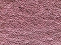 Pink stone grain wall spray painted texture concrete background in retro style