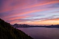 Pink Streaks Light up the Sky Over Crater Lake Royalty Free Stock Photo