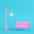 Pink street light with bench on bright blue background in pastel colors