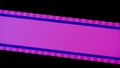 Pink strip of film on black background close up. Cinema filmstrip on black background. 35mm film slide frame. Cinema or