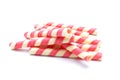 Pink stripe wafer rolls isolated on white background
