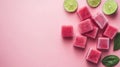 Pink Sugar Cubes with Lime Wedges on Pink Background Royalty Free Stock Photo