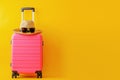 pink suitcase and sunglasses on yellow background, AI generated Royalty Free Stock Photo