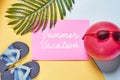 a pink summer vacation sign next to a palm tree Royalty Free Stock Photo