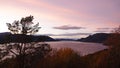 Pink Autumn sunset in Tingvoll fjord in Norway