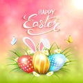 Pink sunny background with Easter eggs and rabbit ears in grass Royalty Free Stock Photo