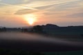 sunrise above low fog Royalty Free Stock Photo