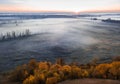 Pink sunrise. Cold morning light. Countryside foggy landscape. Aerial drone photo