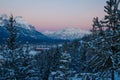 Pink sunrise color above Cascade mountain in Canadain Rockies Royalty Free Stock Photo