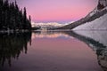 Pink sunrise over alpine lake mountain resort. Royalty Free Stock Photo