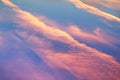 Pink sunset clouds in blue spring sky