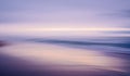 Pink sunset over the sea. Beautiful abstract seascape in light blue and pink colors, motion blur Royalty Free Stock Photo