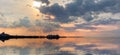 Pink sunset reflection Dramatic cloudy sky at sea on horizon port of Tallinn old town Baltic nature landscape