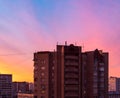 Pink sunset sky over apartment houses in autumn Royalty Free Stock Photo