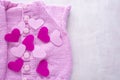 Pink sweater with hearts made of felt