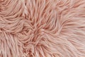 Pink synthetic fluffy fur texture background. Royalty Free Stock Photo