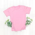 Pink t-shirt with short sleeves and green branches