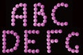 Pink tablets alphabet Royalty Free Stock Photo