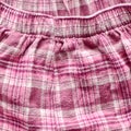 Pink tartan trousers