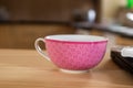 Pink tea cup and mask Royalty Free Stock Photo