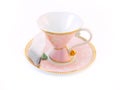 Pink tea cup on a saucer Royalty Free Stock Photo