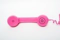 Pink telephone on a white background Royalty Free Stock Photo
