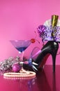 Pink theme Happy New Year party with vintage blue martini cocktail glass and New Years eve decorations Royalty Free Stock Photo